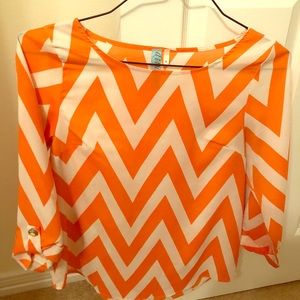 Chevron striped blouse.